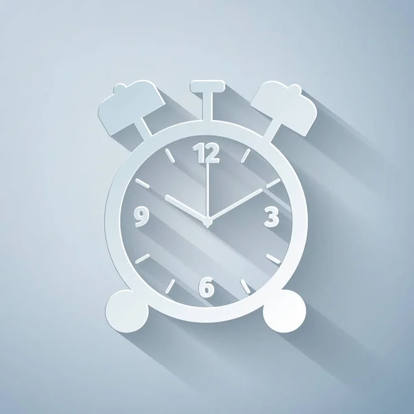 Corte de papel Icono de reloj despertador aislado sobre fondo gris. Despierta, levántate concepto. Señal de tiempo. Estilo de arte de papel. Ilustración vectorial — Archivo Imágenes Vectoriales