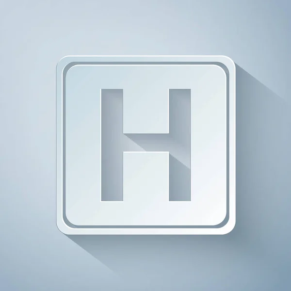 Carta tagliata icona segno ospedale isolato su sfondo grigio. Stile cartaceo. Illustrazione vettoriale — Vettoriale Stock