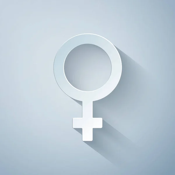 Papiergeschnittenes weibliches Gender-Symbol auf grauem Hintergrund. Venussymbol. das Symbol für einen weiblichen Organismus oder eine Frau. Papierkunst. Vektorillustration — Stockvektor