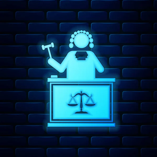 Glowing neon Judge with gavel on table icon isolated on brick wall background. Vector Illustration — Stock Vector