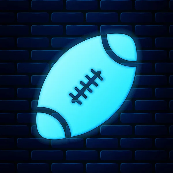 Leuchtende Neon American Football Ball Ikone isoliert auf Backsteinwand Hintergrund. Vektorillustration — Stockvektor