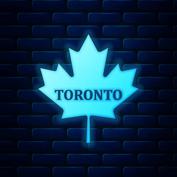 Leuchtendes neonfarbenes kanadisches Ahornblatt mit Stadtnamen-Toronto-Symbol isoliert auf Backsteinmauer-Hintergrund. Vektorillustration — Stockvektor
