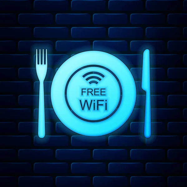 Brillante neón Restaurante Icono de zona Wi-Fi gratuito aislado en el fondo de la pared de ladrillo. Placa, tenedor y cuchillo. Ilustración vectorial — Vector de stock