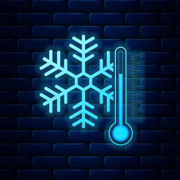 Светящийся неоновый термометр со значком снежинки на фоне кирпичной стены. Векторная миграция — стоковый вектор