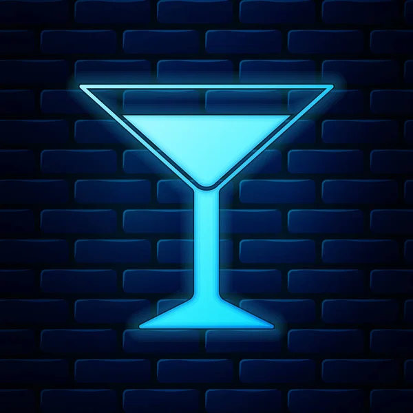 Świecący neon Martini szklana ikona izolowana na tle cegły ściany. Ikona koktajlu. Ikona kieliszka wina. Ilustracja wektora — Wektor stockowy