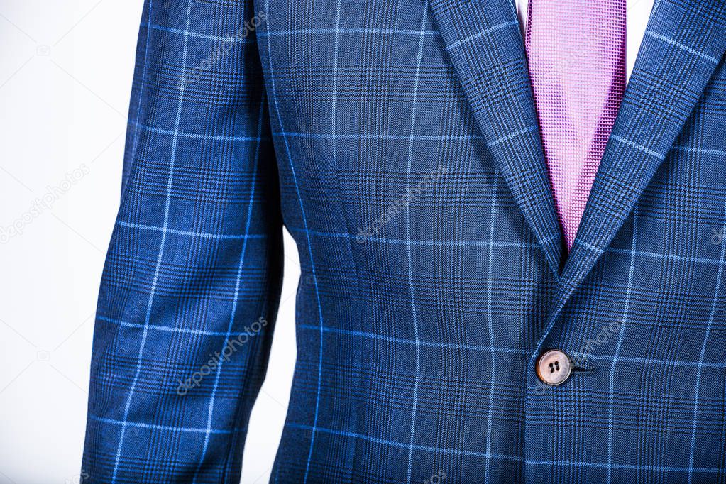 Detail of a blue suit jacket on a man