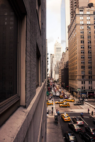 New York, USA - 16 September, 2009: Looking down on 58th street in Manhattan on a normal afternoon with moderate traffic