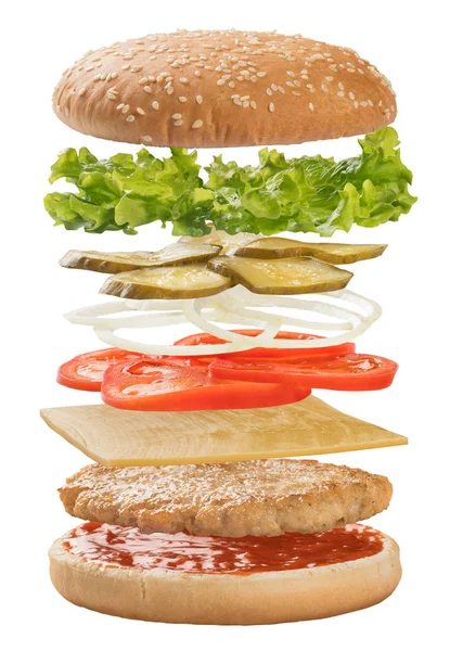 Hambúrguer com ingredientes flutuando no ar — Fotografia de Stock