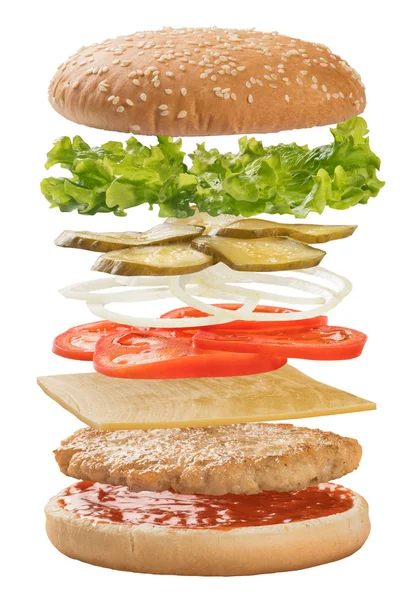 Hamburguesa con ingredientes flotando en el aire — Foto de Stock