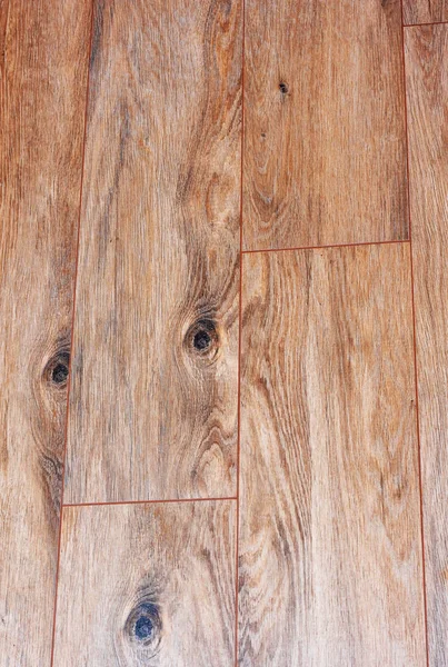 Ceramic tile on the floor in the style of wooden flooring