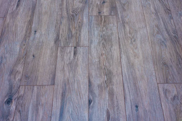 Ceramic tile on the floor in the style of wooden flooring