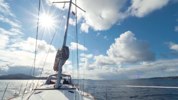 Group of tourists travels by sea on a white beautiful yacht with deflated sails. Cruise in Norway — Stock Video