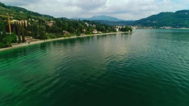 Shooting from helicopter island seascape aerial shot beautiful sea harbour with water transport