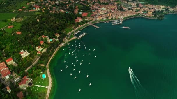 Aerial panning shot beautiful sea harbour with water transport motor boat speed yacht and ship — Wideo stockowe