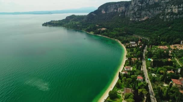 Shooting from helicopter amazing coastline with high natural mountain at background aerial shot — Stockvideo