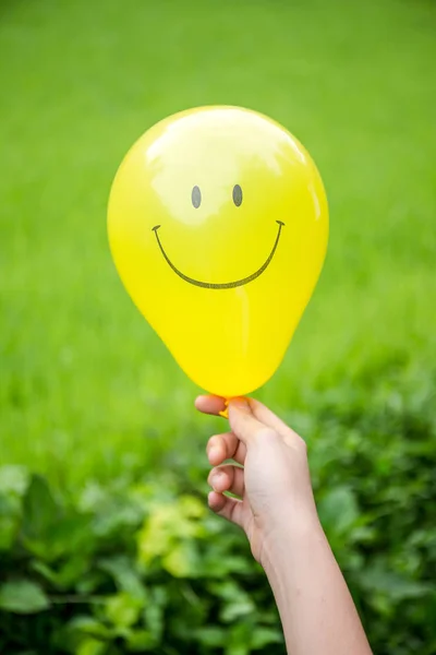 Yellow balloon are smiling