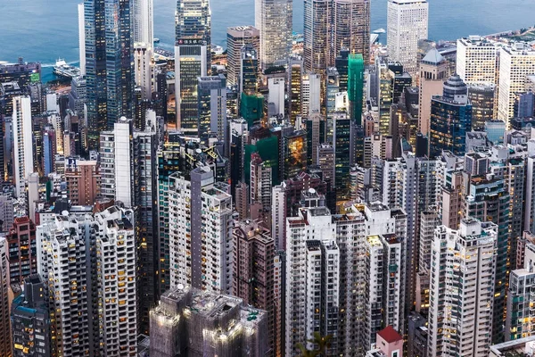 Foresta di cemento per entrambi i lati di Hong Kong Immagine Stock