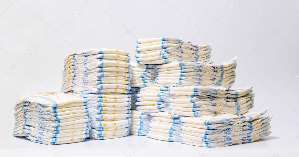 Diapers stacked in a piles