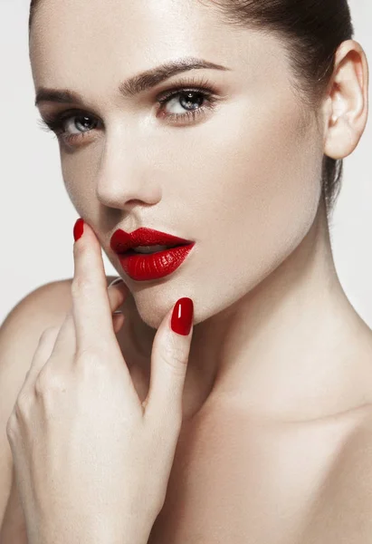 Beautiful young model with red lips — Stock Photo, Image