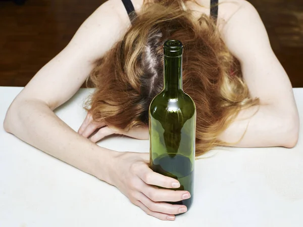 Drunk woman with bottle of — Stock Photo, Image