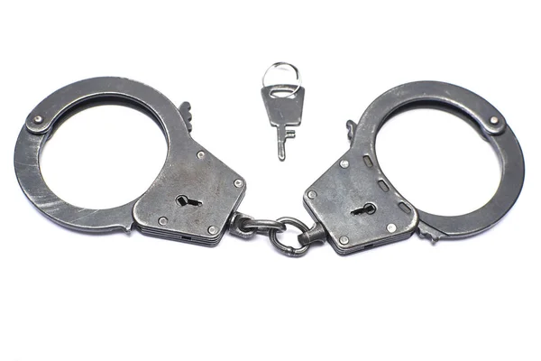 Pair of handcuffs close-up — Stock Photo, Image