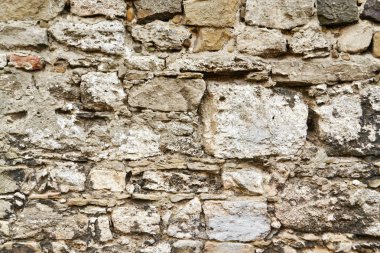 Eski kahverengi ve gri kaldırım taşı döşeli