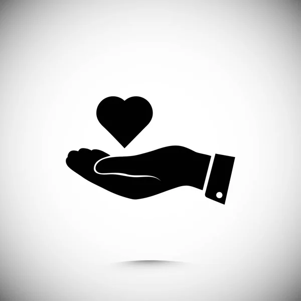 Καρδιά στο χέρι εικονίδιο — Διανυσματικό Αρχείο
