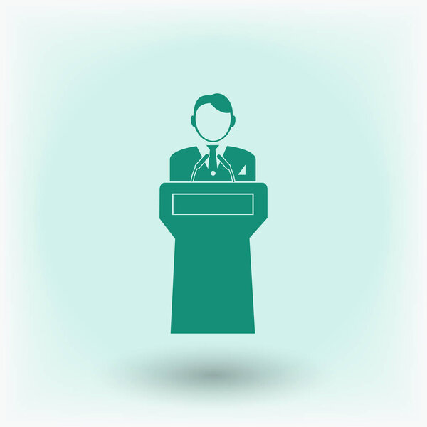  Speaker standing behind podium