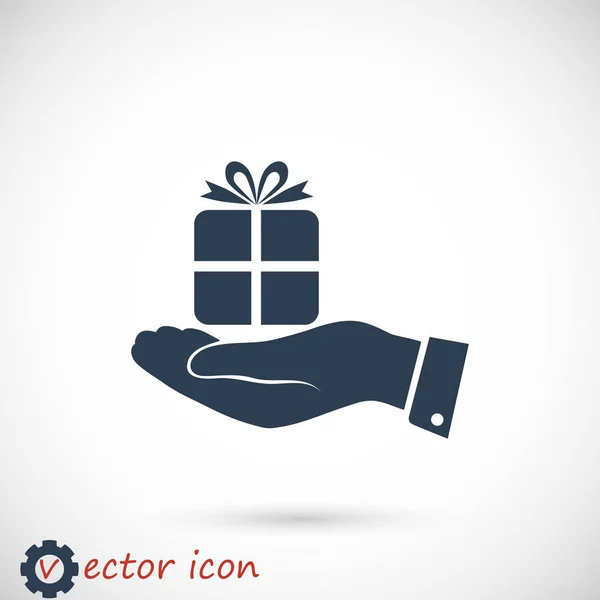 Gift in hand icon — Stock Vector