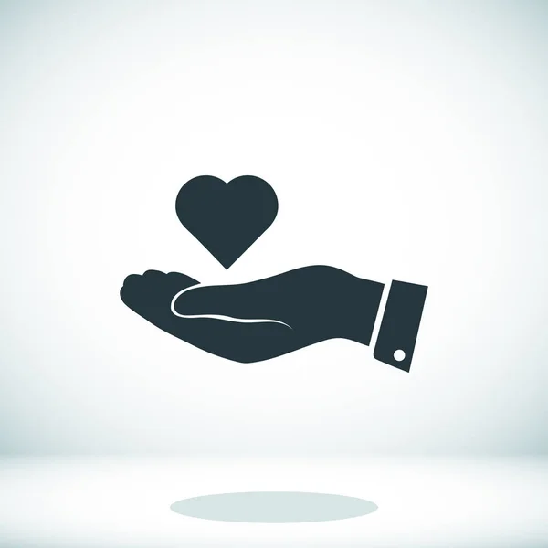 Heart in hand  icon — Stock Vector