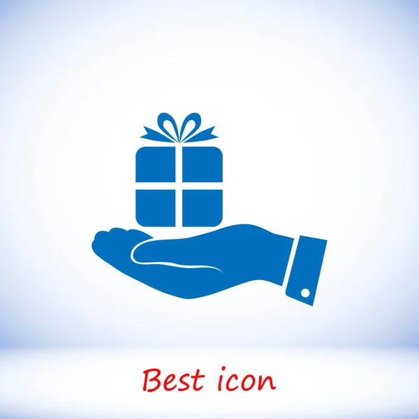 Regalo en icono de la mano — Vector de stock