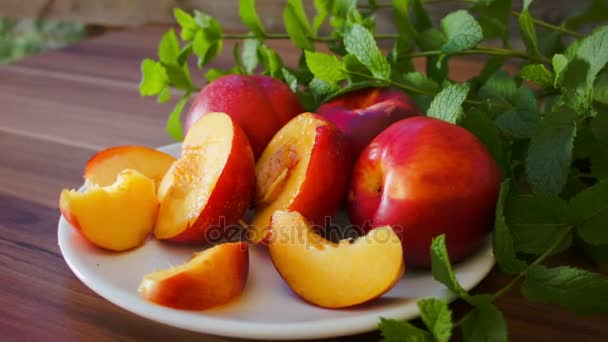 Nectarine on the plate — Stock Video