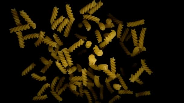 Pasta Fusilli bouncing against to the camera — Stock Video