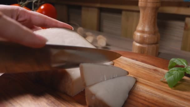 Semi hard sheep cheese cut in pieces — Stockvideo