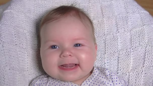 Cute adorable baby smiling happily at the camera — Stock Video