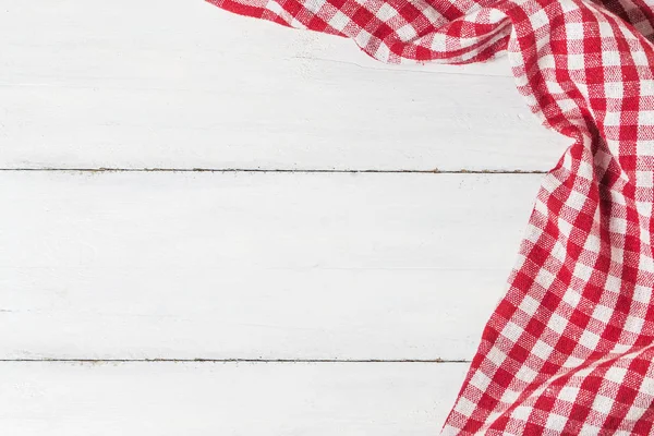 Empty wooden table and cloth red napkin — Stock Photo, Image