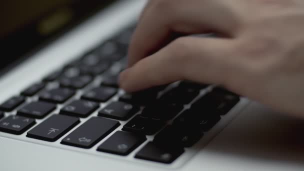 Hands writing on laptop keyboard, close up view in 4k resolution. — Stock Video