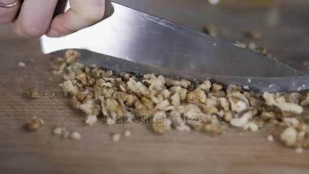 Cutting walnut kernels with knife in 4k, UHD — Stock Video