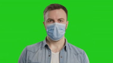 Man wearing hygienic mask. Virus protection. Male wearing medical mask