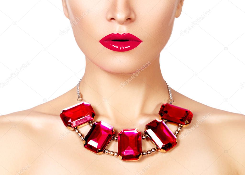 Fashion woman with luxury jewelry. Beautiful girl with bright necklace. Fashionable jewellery and accessories