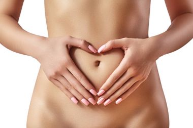 Güzel kadın göbek. Güzel bir kadın mide umurunda değil. Sağlık, sindirim, bağırsak sağlığı. Sağlık, spa. Vücut parçası