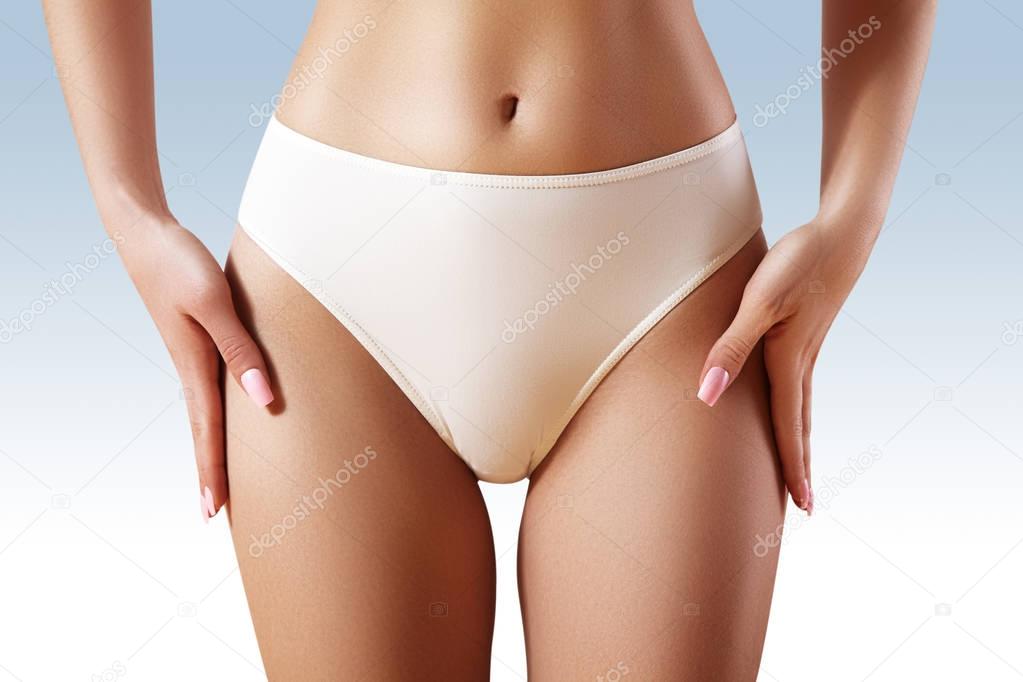 Spa, wellness. Healthy slim body. Beautiful sexy hips. Fitness or plastic surgery. Perfect buttocks without cellulite