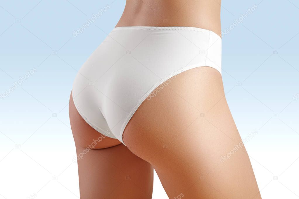 Spa, wellness. Healthy slim body. Beautiful sexy hips. Fitness or plastic surgery. Perfect buttocks without cellulite