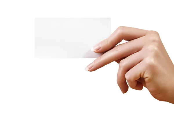 Hermosa mano femenina con tarjeta de visita de papel sobre fondo blanco. Tarjeta de regalo, corte, diseño gráfico — Foto de Stock