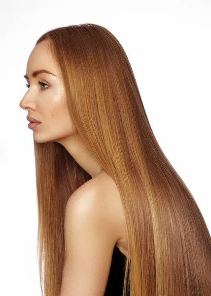 Beautiful yong woman with long straight shiny hair. Sexy fashion model with smooth gloss hairstyle. Keratin treatment — Stock Photo, Image