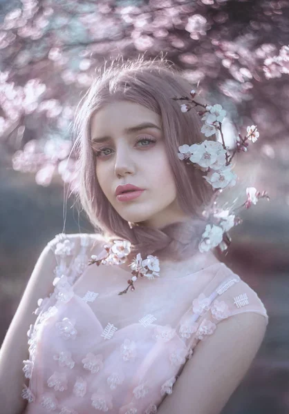 A young girl in spring in a luxurious dres — Stock Photo, Image