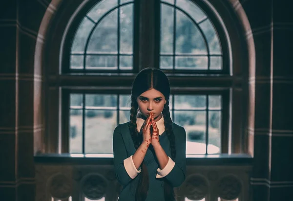 Angry girl student  with bloody hands — Stock Photo, Image