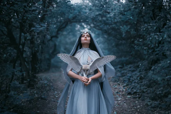 Forest sorceress with a bird — Stock Photo, Image