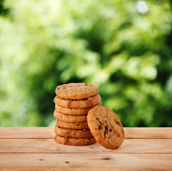 Chocolate Cookies and tea put on Wooden — Stock Photo, Image