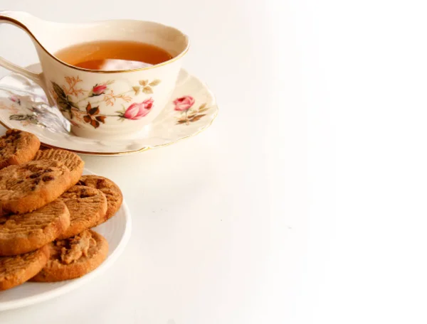Chocolate Cookies and tea are on White Background. — Stock Photo, Image